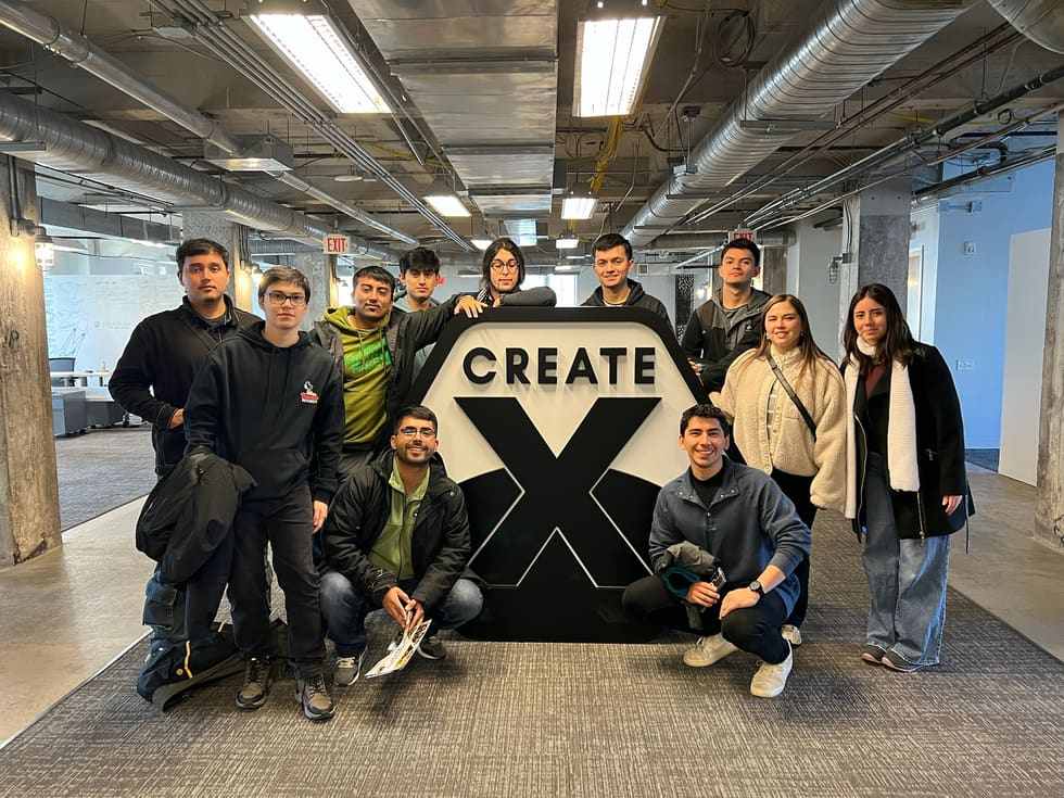 The PAIR team and the rest of the cohort beside the CREATE-X sign, the Georgia Institute of Technology accelerator, in Atlanta.